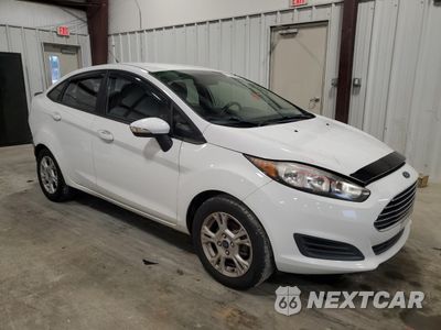 Czwarte zdjęcie samochodu z boku: 2014 FORD FIESTA SE VIN:3FADP4BJ1EM232675 - miniatura