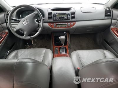 Zdjęcie 8 z 12 samochodu: 2003 TOYOTA CAMRY LE VIN:4T1BE30K73U761422 - miniatura
