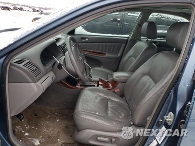 Zdjęcie 7 z 12 samochodu: 2003 TOYOTA CAMRY LE VIN:4T1BE30K73U761422 - miniatura