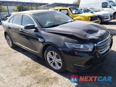 Czwarte zdjęcie samochodu z boku: 2016 FORD TAURUS SEL VIN:1FAHP2H84GG107452 - miniatura