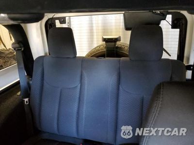 Zdjęcie 10 z 13 samochodu: 2014 JEP WRANGLER S VIN:1C4AJWAG3EL278042 - miniatura