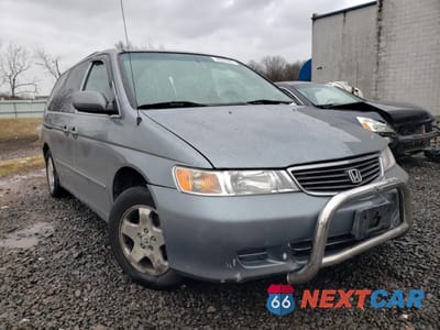 Czwarte zdjęcie samochodu z boku: 2001 HONDA ODYSSEY EX VIN:2HKRL18611H547599 - miniatura