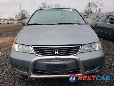 Piąte zdjęcie samochodu w środku: 2001 HONDA ODYSSEY EX VIN:2HKRL18611H547599 - miniatura