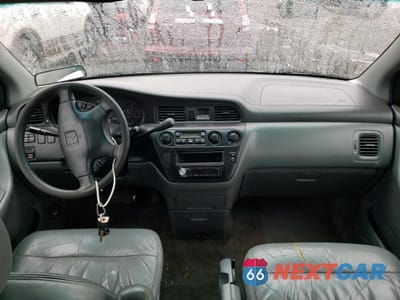 Zdjęcie 8 z 13 samochodu: 2001 HONDA ODYSSEY EX VIN:2HKRL18611H547599 - miniatura