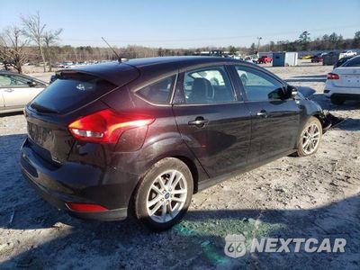 Trzecie zdjęcie samochodu z tyłu: 2015 FORD FOCUS SE VIN:1FADP3K27FL301407 - miniatura