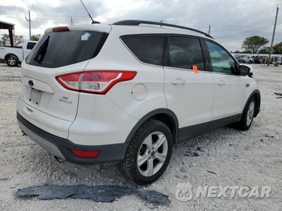Trzecie zdjęcie samochodu z tyłu: 2016 FORD ESCAPE SE VIN:1FMCU0GX7GUB43885 - miniatura