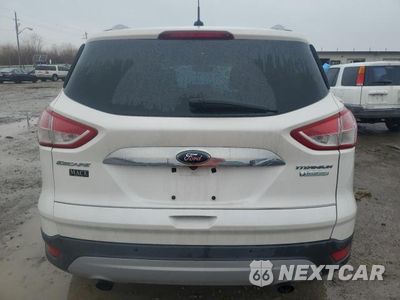 Zdjęcie 6 z 12 samochodu: 2014 FORD ESCAPE TITANIUM VIN:1FMCU0JX9EUC20374 - miniatura