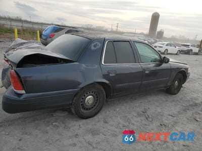 Trzecie zdjęcie samochodu z tyłu: 1999 FORD CROWN VICTORIA POLICE INTERCEPTOR VIN:2FAFP71W8XX113648 - miniatura