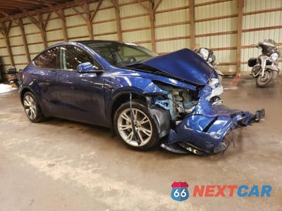 Czwarte zdjęcie samochodu z boku: 2023 TESLA MODEL Y VIN:7SAYGDEE4PF676637 - miniatura