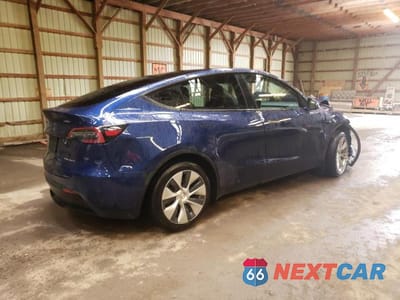 Trzecie zdjęcie samochodu z tyłu: 2023 TESLA MODEL Y VIN:7SAYGDEE4PF676637 - miniatura