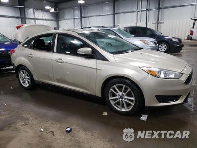 Czwarte zdjęcie samochodu z boku: 2017 FORD FOCUS SE VIN:1FADP3F2XHL254726 - miniatura