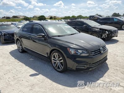 Czwarte zdjęcie samochodu z boku: 2016 VOLKSWAGEN PASSAT S VIN:1VWAS7A35GC057672 - miniatura