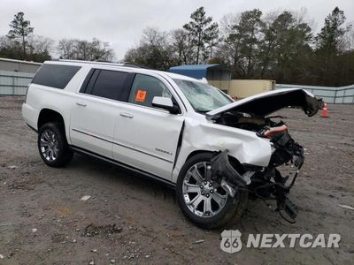 Czwarte zdjęcie samochodu z boku: 2016 GMC YUKON XL DENALI VIN:1GKS1HKJ1GR438580 - miniatura