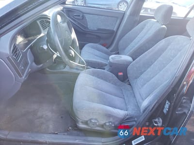 Zdjęcie 7 z 12 samochodu: 2003 HYUNDAI ELANTRA GLS VIN:KMHDN45D21U120524 - miniatura