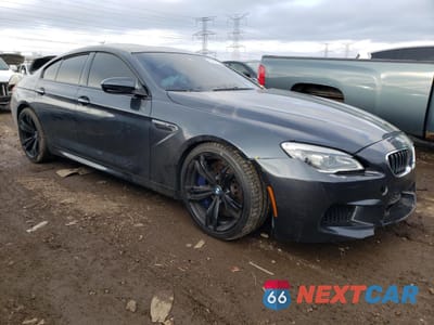 Czwarte zdjęcie samochodu z boku: 2018 BMW M6 GRAN COUPE VIN:WBS6E9C57JG808256 - miniatura