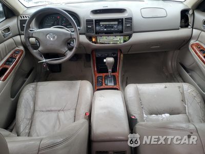 Zdjęcie 8 z 12 samochodu: 2002 TOYOTA CAMRY LE VIN:JTDBF30K420057170 - miniatura