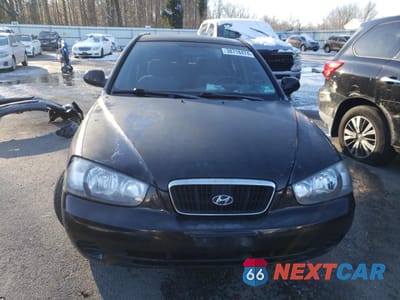Piąte zdjęcie samochodu w środku: 2003 HYUNDAI ELANTRA GLS VIN:KMHDN45D21U120524 - miniatura