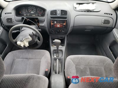 Zdjęcie 8 z 12 samochodu: 2000 MAZDA PROTEGE DX VIN:JM1BJ2226Y0235417 - miniatura