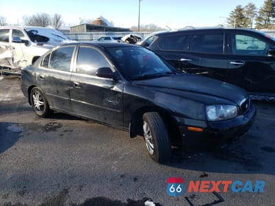 Czwarte zdjęcie samochodu z boku: 2003 HYUNDAI ELANTRA GLS VIN:KMHDN45D21U120524 - miniatura