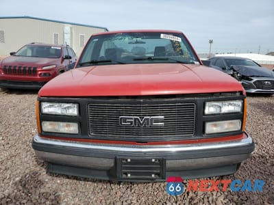 Piąte zdjęcie samochodu w środku: 1990 GMC SIERRA K1500 VIN:1GTDK14K8LZ542458 - miniatura