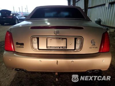 Zdjęcie 6 z 13 samochodu: 2004 CADILLAC DEVILLE DTS VIN:1G6KF57934U239813 - miniatura
