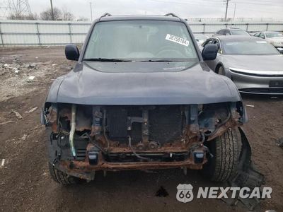 Piąte zdjęcie samochodu w środku: 2002 MITSUBISHI MONTERO LIMITED VIN:JA4MW51R92J001150 - miniatura