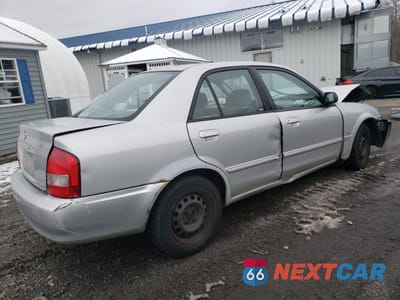 Trzecie zdjęcie samochodu z tyłu: 2000 MAZDA PROTEGE DX VIN:JM1BJ2226Y0235417 - miniatura