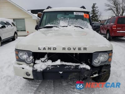 Piąte zdjęcie samochodu w środku: 2004 LAND ROVER DISCOVERY II SE VIN:SALTY19484A835662 - miniatura