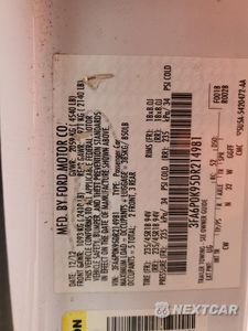 Zdjęcie 14 z 14 samochodu: 2013 FORD FUSION TITANIUM VIN:3FA6P0K95DR214981 - miniatura