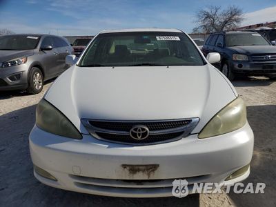 Piąte zdjęcie samochodu w środku: 2004 TOYOTA CAMRY LE VIN:JTDBE32K940257058 - miniatura