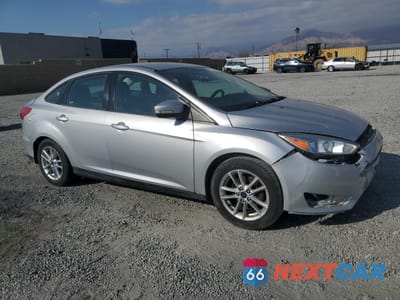 Czwarte zdjęcie samochodu z boku: 2016 FORD FOCUS SE VIN:1FADP3F27GL286497 - miniatura
