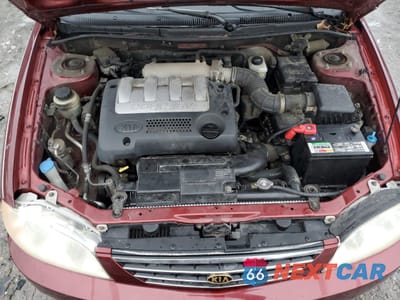 Zdjęcie 11 z 12 samochodu: 2003 KIA SPECTRA BASE VIN:KNAFB121335215523 - miniatura