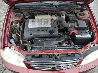 Zdjęcie 11 z 12 samochodu: 2003 KIA SPECTRA BASE VIN:KNAFB121335215523 - miniatura