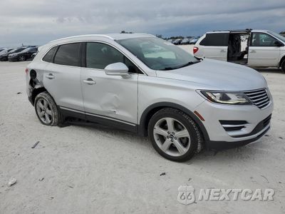 Czwarte zdjęcie samochodu z boku: 2018 LINCOLN MKC PREMIERE VIN:5LMCJ1C92JUL00877 - miniatura