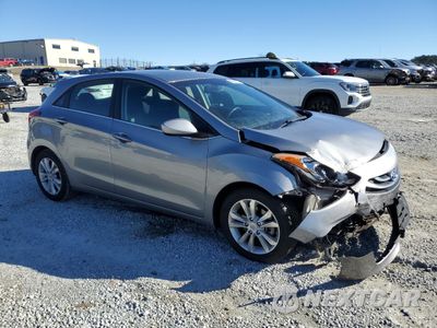 Czwarte zdjęcie samochodu z boku: 2013 HYUNDAI ELANTRA GT VIN:KMHD35LE4DU127132 - miniatura