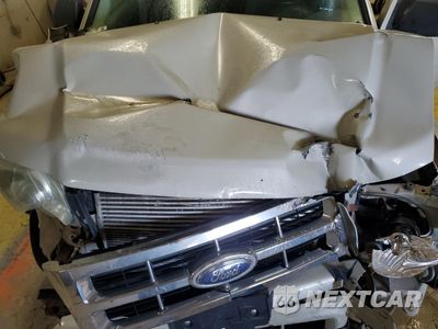 Zdjęcie 12 z 13 samochodu: 2009 FORD ESCAPE XLT VIN:1FMCU93G49KB10609 - miniatura