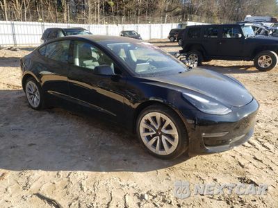 Czwarte zdjęcie samochodu z boku: 2021 TESLA MODEL 3 VIN:5YJ3E1EB7MF015178 - miniatura