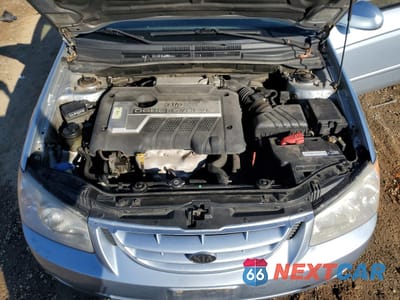 Zdjęcie 11 z 12 samochodu: 2005 KIA SPECTRA LX VIN:KNAFE121365236917 - miniatura