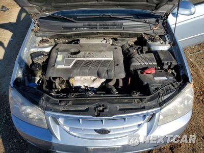 Zdjęcie 11 z 12 samochodu: 2005 KIA SPECTRA LX VIN:KNAFE121365236917 - miniatura
