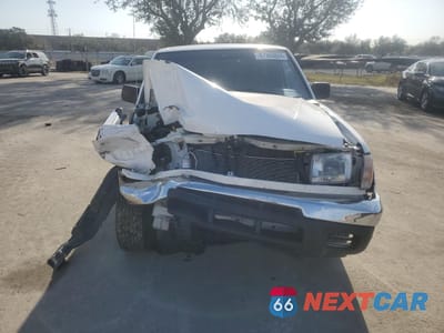 Piąte zdjęcie samochodu w środku: 1999 NISSAN FRONTIER KING CAB XE VIN:1N6DD26S7XC306466 - miniatura