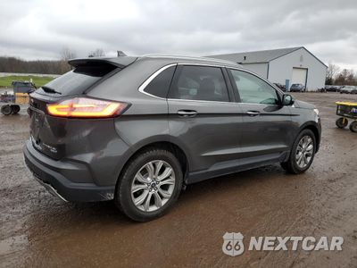 Trzecie zdjęcie samochodu z tyłu: 2019 FORD EDGE TITANIUM VIN:2FMPK4K95KBC37429 - miniatura