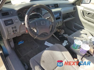 Zdjęcie 8 z 13 samochodu: 1999 HONDA CR-V LX VIN:JHLRD2844XC010900 - miniatura