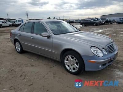 Czwarte zdjęcie samochodu z boku: 2003 MERCEDES-BENZ E 320 VIN:WDBUF65J73A186783 - miniatura