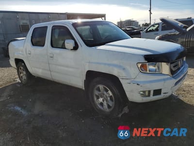 Czwarte zdjęcie samochodu z boku: 2009 HONDA RIDGELINE RTS VIN:5FPYK16429B108803 - miniatura