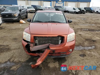 Zdjęcie 9 z 24 samochodu: 2010 DODGE CALIBER MAINSTREET VIN:1B3CB3HA9AD565865 - miniatura