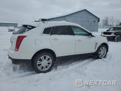 Trzecie zdjęcie samochodu z tyłu: 2012 CADILLAC SRX LUXURY COLLECTION VIN:3GYFNAE35CS620144 - miniatura