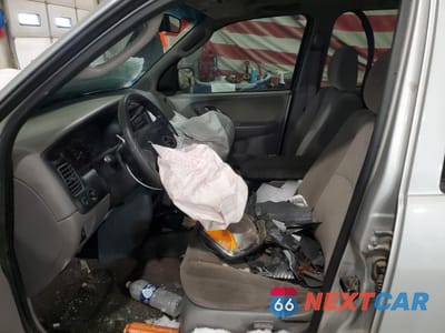 Zdjęcie 7 z 14 samochodu: 2002 MAZDA TRIBUTE LX VIN:4F2YU08182KM55819 - miniatura