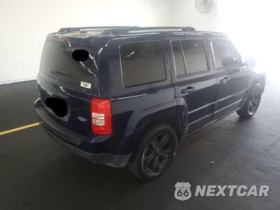 Czwarte zdjęcie samochodu z boku: 2015 JEEP PATRIOT LATITUDE VIN:1C4NJRFB9FD271933 - miniatura