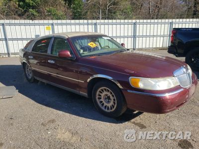 Czwarte zdjęcie samochodu z boku: 2001 LINCOLN TOWN CAR CARTIER VIN:1LNHM83WX1Y732737 - miniatura