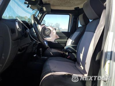 Zdjęcie 7 z 14 samochodu: 2012 JEEP WRANGLER UNLIMITED SAHARA VIN:1C4BJWEG4CL119025 - miniatura